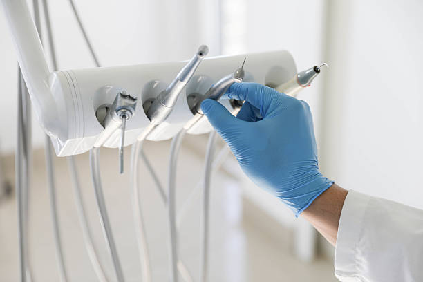 Professional Invisalign Clear Aligners technician working in Tye, TX